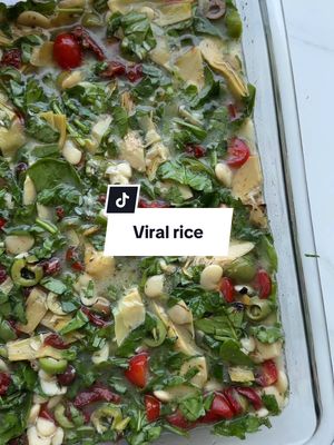 A post by @healthygirlkitchen on TikTok caption: VIRAL ONE PAN RICE 🍅🍚🌱 Ingredients: 1 cup rice 1 can butter beans rinsed and drained 1 tbsp minced garlic 1 cup sliced italian olives 1 cup sliced cherry tomatoes 1 cup chopped sundried tomatoes 2 cups chopped spinach 1 10oz jar marinated artichoke hearts Parsley for garnish 1/2 lemon juiced 1/2 cup coconut milk 2.5-3 cups water 1 tsp salt 1/4 tsp pepper Garnish: vegan feta + parsley Mix all together in a casserole dish making sure the rice is covered well. Bake for 40 min or until rice is cooked at 400 F. Garnish with vegan feta and parsley! #dinner #EasyRecipes #healthyrecipes #healthyfood #recipes #mediterranean #veganfood #plantbased