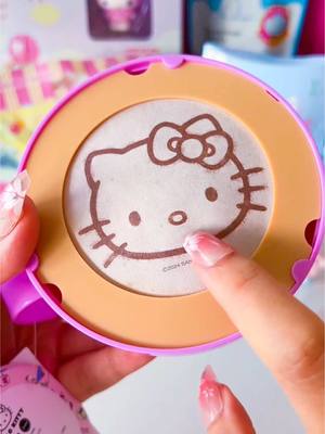 A post by @tiktoksupers on TikTok caption: Sanrio Hello Kitty squishy cappuccino cup surprise unboxing! 😍 @BanterToys @kmart australia @KAP TOYS   #sanrio #hellokitty #unboxing #squishy #kawaii #cute 