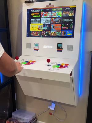 A post by @seanbryant on TikTok caption: Recently installed the new #polycade    #arcade the mountable and clean looking #arcadecabinet from the founder of #atari son, Tyler. I booted up #cuphead and I can’t believe how amazing this looks and plays. Yes, suck at it. Any other games I should check out? Yes, I also know I need to do something about the wires, I dont have an outlet on the other side of the wall.