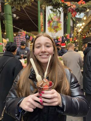 A post by @athinaeconomon on TikTok caption: athina made us do it #chocolatestrawberries #boroughmarket #london #fyp 