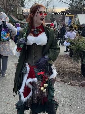 A post by @gillianfoxglove on TikTok caption: I had a blast running around freezing my butt off at the PA Yule festival!! #renfaire #yule #costume 