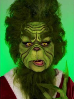 A post by @illumin_arty on TikTok caption: 15 hour Grinch makeup transformation 😱  rate 1-10 👀My fave video I've EVER made !!#thegrinch #grinch #christmas #grinchmakeup #grinch #sfxmakeup #makeuptransformation 