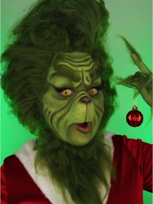 A post by @illumin_arty on TikTok caption: Crazy 15 hour grinch makeup transformation 😱 rate 1-10  👀#thegrinch #grinch #christmas #makeuptransformation #sfxmakeup #makeup #christmasmakeup 