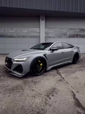 A post by @car.hub.official4 on TikTok caption: perfection #audi #rs7 