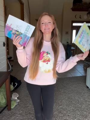 A post by @artbyandreaehrhardt on TikTok caption: 2 Coloring Books = Perfect Last-Minute Stocking Stuffer! 🎁✨ What coloring book theme should I create next? 🤔 Some possibilities are animals on clouds, glitter rain clouds, peacocks/mandalas, farm animals, etc.. anything related to my current art/life! 🎨