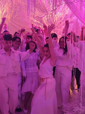 A post by @annecurtissmith on TikTok caption: Hello, from us 🥂 Last Christmas party of the year with peeps I love in the industry!!! 