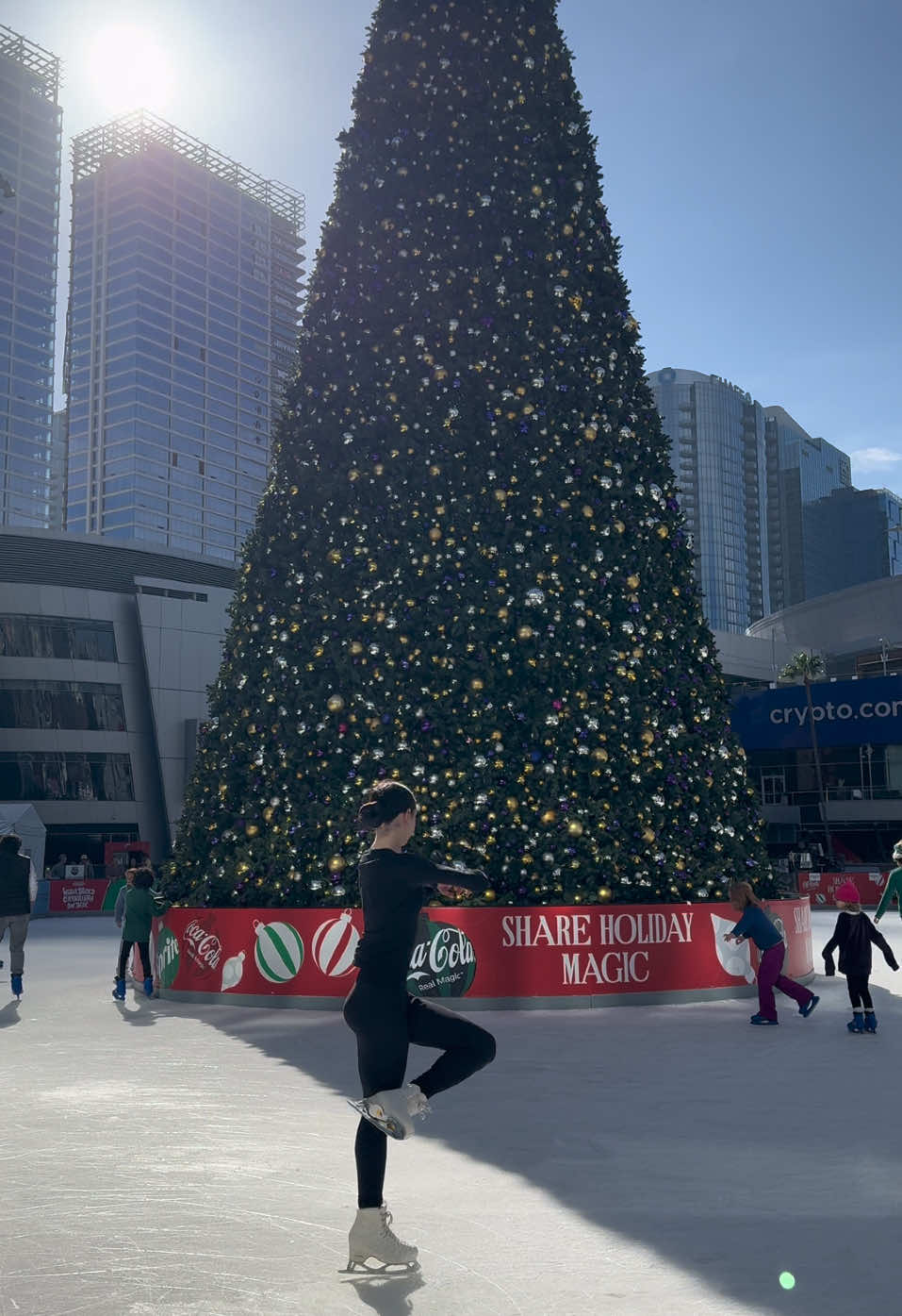 A post by @sophie.skatesss on TikTok caption: 🎄🫶🏼#figureskating #fyp #christmas #iceskatingtiktok #skating #iceskater #skates #winter #christmastree #losangeles #lalive #foryou #fypシ゚viral #viralvideo #blowthisup #blowup #xyzbca #abcxyz #trend #trending #outdoorrink #outdoorskating #figureskatingtiktok 