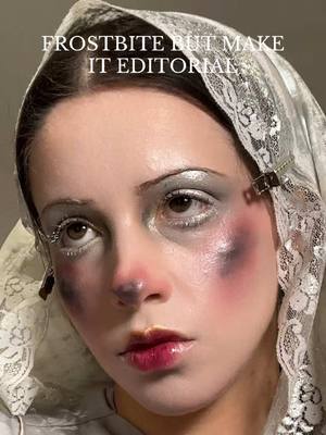 A post by @charlottelooks on TikTok caption: FROSTBITE makeup but make it EDITORIAL ❄️ inspired by John Galliano 2009 runway makeup by @Pat McGrath Labs  @KVD Vegan Beauty good apple foundation @maccosmetics burnt pepper blush @urban decay naked metals palette @Anastasia Beverly Hills snowflake highlighter @MaybellineUK glitter mascara @Laura Mercier plum fatale lipstick @Lancôme liquid eyeshadow and juicy tube magic spell #makeup #beauty #fashion #johngalliano #patmcgrath #wintermakeup 