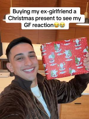 A post by @isaaccervantes9 on TikTok caption: Why would she do that😭😭 #viral #couple #girlfriend #christmas 