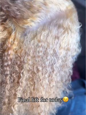 A post by @official_sion_tha_kidd on TikTok caption: Black to icy… with curls still in tact 💃🏾💃🏾💃🏾 #curlyhair #bluedress #thingstodoinatlanta #blondecurls #blondehair #blondie #sanantoniohair #hairstyleideas #haircolor #haircolorist 