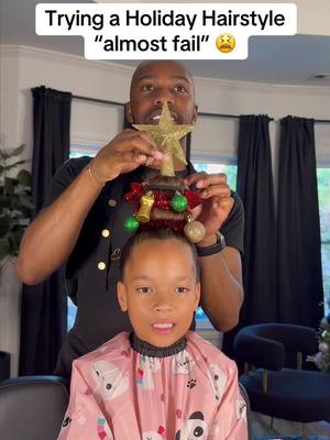 A post by @terrell_jarius on TikTok caption: Doing all the little things to make Christmas special.. including a new hairstyle for our little princess in #EqualHairSalon She wanted a Christmas hairstyle to kick off Christmas Day and what better way to do it than with an actual Christmas Tree? 😅 Rate this 1-10 in the comments but remember… I’m trying new things so go easy on me lol. What could I do better next time?