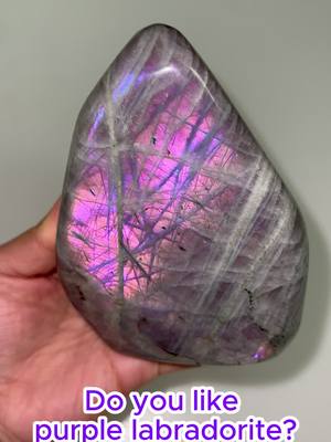 A post by @fadkeys_crystal on TikTok caption: Do you like purple labradorite #crystal #crystals #fadkeys #labradorite 