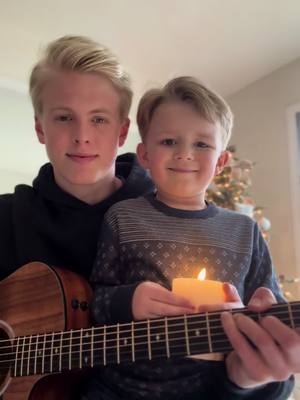 A post by @carsonlueders on TikTok caption: Teaching my nephew a Christmas classic 🤍