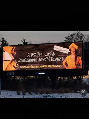 A post by @jamesmurrayjokers on TikTok caption: So proud to be married to New Jersey's official Ambassador of Cheese. Take a photo with Melyssa's billboard by Jan. 2, email me the photo at murrpromos@gmail.com, and I'll send you an autographed postcard from Impractical Jokers! The billboard is in Flemington, NJ across the highway from the Burger King, located at: 309 US-202 S Flemington, NJ  08822 Merry Christmas, all!@Melyssa Murray 