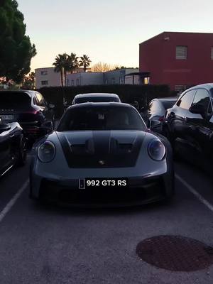 A post by @ktmatteo25 on TikTok caption: The 992 GT3 RS is so agressive🥵#fypppppp #fypppppppppppppp #foryou #foryoupage #CapCut #edit #porsche #gt3 #rs #carspotting #edit 