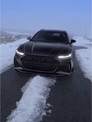 A post by @rs6ne on TikTok caption: 🎄🎄🖤❄️ #audi #rs6 #cars #foryou #fyp #carsoftiktok #cartok 