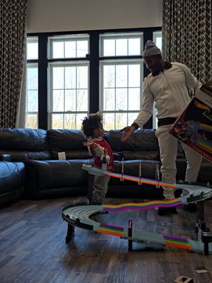 A post by @navarroesq on TikTok caption: Nothing like building and putting together all gifts for a week straight after xmas 😀😀.  me and Gator 🐊 putting together the #hotwheels #mariokart #rainbowroad #mariokartrainbowroad #fatherson #fathersonlove #fathersonduo #fyp #daddyduties #guccigang🇳🇵 #lighteningmcqueen 