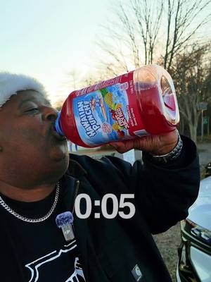 A post by @realbadlandschugs on TikTok caption: Gallon Hawaiian Punch Fruit Juicy Red Chug By a Frozen Lake #gallonchug #hawaiianpunch #badlandschugs 