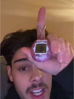 A post by @zachrmorris on TikTok caption: Bring back the Tamagotchi  #tamagotchi #fyp #fy #haul #christmashaul 