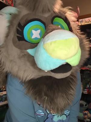 A post by @alienferretbabe on TikTok caption: Would you help a ferret in need? #furryfandom #fursuit #furrytiktok #fursona #disneystitch #disney #liloandstitch #stitch #collection 