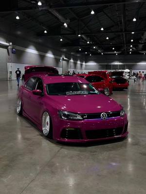 A post by @rewelsworld on TikTok caption: Chat ,Did we cook on this build #volkswagen #vw #mk6jetta #mk6 #jetta #fypシ゚viral #stance #wrap #pinkcar 