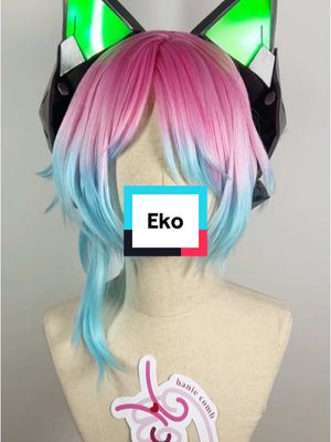 A post by @_hanie.c on TikTok caption: Styling an Original Character wig! I dyed this one with neon dyes which makes it vibrant then gave it layered trim #wigstyling #cosplaywig 