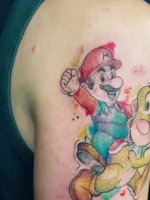 A post by @officialmarci96 on TikTok caption: Letztes Tattoo für dieses Jahr ❤️‍🔥  wünsche euch allen einen Guten Rutsch🥂🎉 und bleibt Gesund 🍀🥰@kimii #tattoo #supermario #joshi #livemylife #gayboy #fürdich #fy 