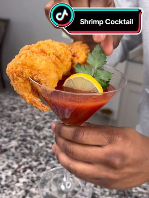 A post by @chefkeysh on TikTok caption: Taking shrimp cocktail to the next level with crispy coconut fried shrimp using @Louisiana Fish Fry Seasoned Shrimp Fry and their zesty Cocktail Sauce! 🦐🥥✨ Perfectly golden, perfectly delicious.