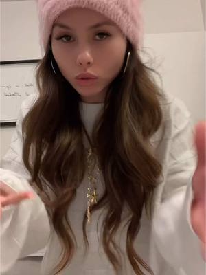 A post by @tasssani on TikTok caption: SOS how is the hair supposed to sit when you wear a beanie??