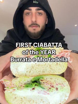 A post by @cumpariluca on TikTok caption: FIRST CIABATTA OF THE YEAR | Burrata, Mortadella di Bologna e Pesto di Pistacchio in Olio 🎉🥪🇮🇹 Produit disponible «L'epicerie Italienne» 9 Rue Aubernon 06600 Antibes, France.📍 #sandwich #ciabatta #fyp #italy #asmr #newyear #party #fete #yum #FoodTok #amor #italianfood #news #popular #cuisine #recette #rapide #facile #pain #italia #italie #burrata #cheese #date #italiano #pic #vira #viral_video #bread #loveyou #learn #mode #hoodie #outfit #musica #apprendre #bonappetit #ciaoatutti #passion #amour #edutok #edit #bags #sac #BlackTikTok #pesto #fromage #charcuterie #ham #mortadella #mozzarella #song 