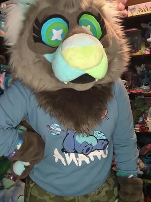 A post by @alienferretbabe on TikTok caption: Apologize to me for not buying me Stitch stuff 😞 #furrytiktok #furry #fursona #disneystitch #disney #liloandstitch #stitch #fursuit 