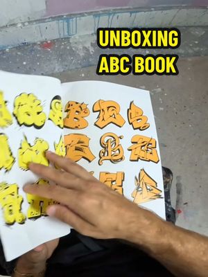 A post by @sprayculture on TikTok caption: Unboxing ABC BOOK from MRIOES #unboxing #graffiti #art #artist #alphabets #books #book #asmr #pov #fyp #fypシ゚ #foryou 