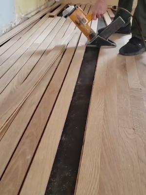 A post by @wixflooring on TikTok caption: hardwood floor installation unfinished floors #flooring #HomeImprovement #floorrefinishing #flooringinstallation 