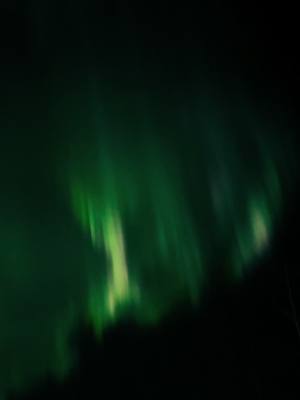 A post by @hanalaska on TikTok caption: #northernlights #newyearseve #2025 #happynewyear 