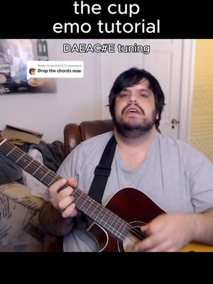 A post by @freddy_dearmaryanne on TikTok caption: Replying to @woah4331 I can't put down the cup tutorial #emo #midwestemo #daveblunts #icantputdownthecup #guitar 