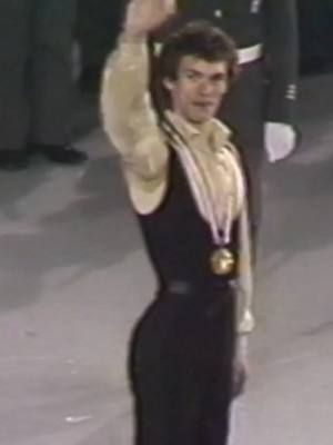 A post by @allhailhanyu on TikTok caption: during the 2026 Olympics it'll be 50 years since John Curry won his Olympic gold and he's still the best to ever do it artistically #figureskating #johncurry #winterolympics #olympics #IceSkating 