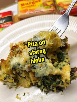 A post by @__kacolina on TikTok caption: ✨Pita od starog hleba✨ Sastojci: - Stari hleb (kod mene oko 500gr) - Jaja 6 komada - Mleko 1 i po čaša - Pavlaka za kuvanje malo manje od pola čaše - Začini po ukusu (so, biber, bosiljak, vegeta, beli luk u prahu) - Prezident topljeni listići sa ukusom Gaude 1 pakovanje - Rendani kačkavalj oko 150gr (50gr za posipanje) - Puter oko 2 kašike - Beli luk po ukusu - Spanać 250gr - Slanina i pršuta koliko vam duša ište samo pripazite na količinu soli ako ubacujete veću količinu *Umesto slanine i pršute možete ubaciti i kobasicu, samo u tom slučaju koristite Prezident topljene listiće sa ukusom Gaude. Postupak se vidi u snimku. Pekla sam oko 20-25 minuta na 180 ili dok nije porumenelo, dodala kačkavalja odgore, vratila u rernu na par minuta da se otopi i nakrkala se kao prava gospoja. Prijatno!  #kacolina #presidentsrbija #przenice #pita #Recipe #recept #EasyRecipe #balkanfood #balkantiktok #balkanviral #DinnerIdeas #bacon #slanina #cheese #leftoverbreadrecipes 