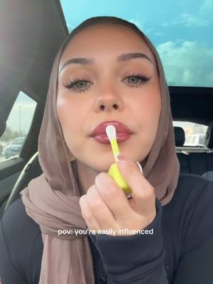 A post by @justbriyonce on TikTok caption: new fav @byoma #makeuphaul #makeup #lipoil #grwm #makeuptutorial #Vlog #hijabitiktok #hijabstyle #HijabFashion 