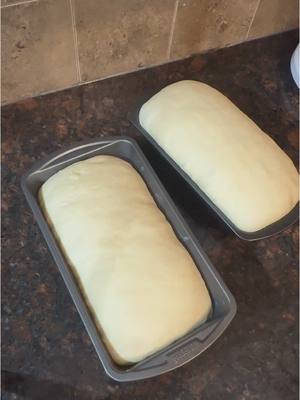 A post by @living_as_lashay on TikTok caption: Beginner Friendly Bread Recipe #fyp #DIY #cooking -#baking #breadloaf                           YIELD 2 Loaves PREP TIME 20 minutes BAKE TIME 25 to 30 minutes REST TIME 20 minutes RISE TIME 45 minutes Ingredients 5½–6 cups all purpose flour 3 tablespoons sugar 2 (4½ tsp.) envelopes Fleischmann's® RapidRise® Instant Yeast OR RapidRise® PLUS Instant Yeast 2 teaspoons salt 1½ cups water ½ cup milk 2 tablespoons butter OR margarine OPTIONAL Tangzhong Paste (4tbsp flour, 4tbsp water, 9tbsp milk 1/4 of 6ounce can of Pineapple Juice  Directions OPTIONAL: Combine Tangzhong ingredients and cook on Medium Heat until it becomes a paste. Once pasta is ready, sit aside. In large bowl, combine 2 cups flour, sugar, undissolved yeast and salt. Heat water, milk and butter until very warm (120° to 130°F); stir into flour mixture. Beat 2 minutes at medium speed of electric mixer, scraping bowl occasionally. Stir in 1 cup flour; beat at high speed for 2 minutes, scraping bowl occasionally.  OPTIONAL: if adding in Tangzhong and pineapple juice, add it now. Stir in enough remaining flour to make soft dough. Knead on lightly floured surface until smooth and elastic, about 8 to 10 minutes. Cover; let rest 20 minutes. Divide dough in half. Roll each half to 12 x 7-inch rectangle. Beginning at short end of each rectangle, roll up tighly as for jelly roll. Pinch seams and ends to seal. Place, seam sides down, in two greased 8½ x 4½-inch loaf pans. Cover; let rise in warm, draft-free place until doubled in size, about 45 minutes. Bake at 400°F for 25 to 30 minutes or until done. Remove from pans; cool on wire rack.