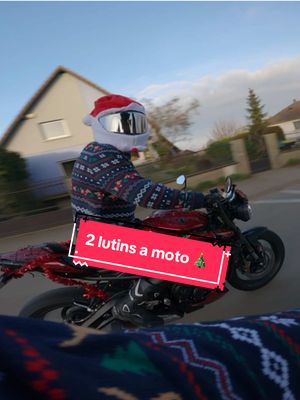 A post by @deltaa_fr on TikTok caption: Balade de père Noël partie 1  Comme d’habitude je publie toujours en retard 🫡  #fyp #moto #motard #noel #perenoel #bmw #s1000r #motovlog 