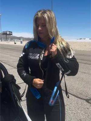 A post by @swoop_motorsports on TikTok caption: Repost from @mrs_swoop • Throw back to @lvmotorspeedway when you’re at the top end of the race track and it’s 100+ degrees and you’re in a fire suit 🏁🔥🥵 Hot-mess!  #justhavingfun 😜 #sexyfast #race #dragrace #racesuit #hot #sweatyselfie @Mrs Swoop Official Page 