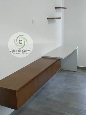 A post by @caswilcocinasyclosets on TikTok caption: Mueble TV con escritorio