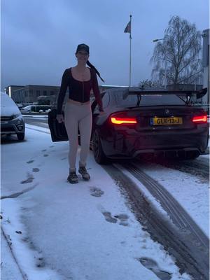 A post by @the_detailing_girl on TikTok caption: What was supposed to be a cute video of me drifting my bmw M2C  in the snow ended up in not getting her inside my garage anymore 🤣😂 the struggle is real.  #bmwm2 #bmwm2competition 