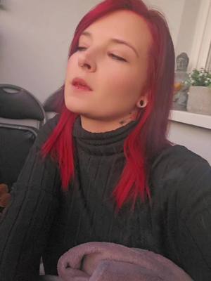 A post by @michelleneumann27 on TikTok caption: #tattoogirl❤️ #fy #longnails #redhair #ilovehaters 