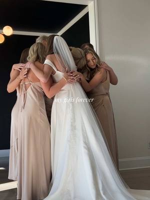 A post by @lauren.mae16 on TikTok caption: I love these girls 🤍🕊️ #wedding #weddingday #bridesmaids #bridalparty #bride #firstlook 