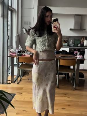 A post by @seldery on TikTok caption: skirts in winter are fun 🌺 #fyp 