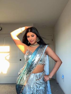 A post by @drisya.reghuram on TikTok caption: Ringing in 2025 as your certified desi girl ✨🪩 #desigirl #priyankachopra #bollywooddance #desi Outfit: @Lashkaraa 