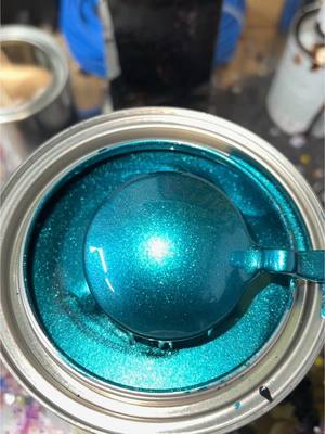 A post by @painthuffermetalflake on TikTok caption: Amazing Sunday Mixing up our New "TRON" Premium PAINTHUFFER X House of Kolor Metallic Basecoat⚡️⚡️⚡️ This amazing color is Available in All Sizes including our PREMIUM Spray Cans for Easy Application!! - LINK IN BIO TO ORDER✨✨✨