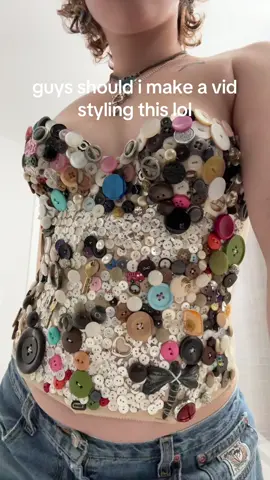 A post by @sydneyl3vy on TikTok caption: i’m gonna make this project everyone’s problem #upcycle #thriftflip #sewing #buttons #design 
