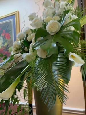 A post by @officialfuneralworld on TikTok caption: A Celebration of Life #officialfuneralworld #ofwmediateam #celebrationoflife #blackexcellence #evergreenmemorialfuneralhometx #dallastexas #floralarrangement #batesvillecasketcompany 